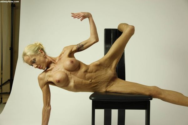 very skinny woman posing nude for
