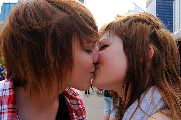 Young Women Kissing Girls: