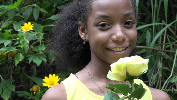 boxconnect.org: C1174 african teen girl happy yellow.mov - Y
