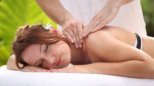 Woman Enjoying Neck Massage in