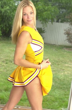 Teen Blonde Cheerleader In Yellow..