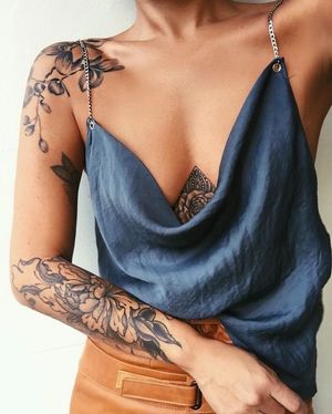 amazing cohesive tattoos! floral black..