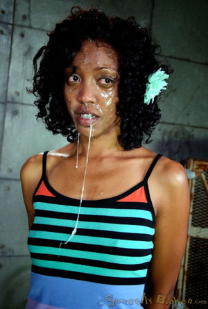 Blindfolded ebony girl tied to