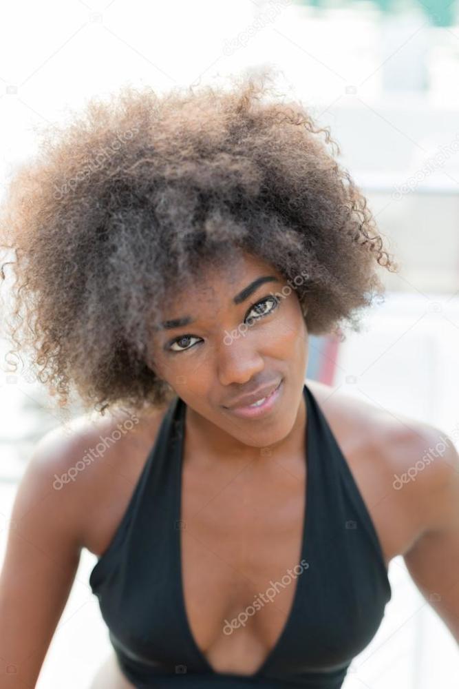afro american brunette girl on sailing yacht - Stock Photo