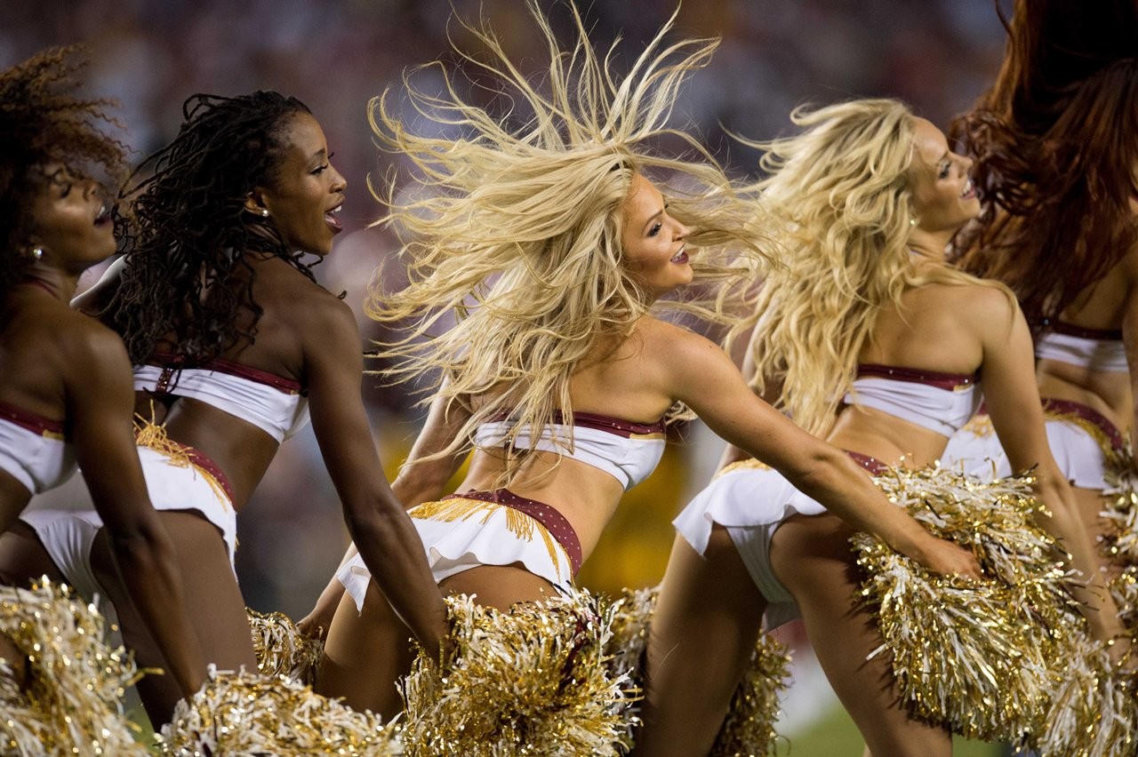 PHOTOS: Cheerleaders Root On The Redskins Over The Raiders