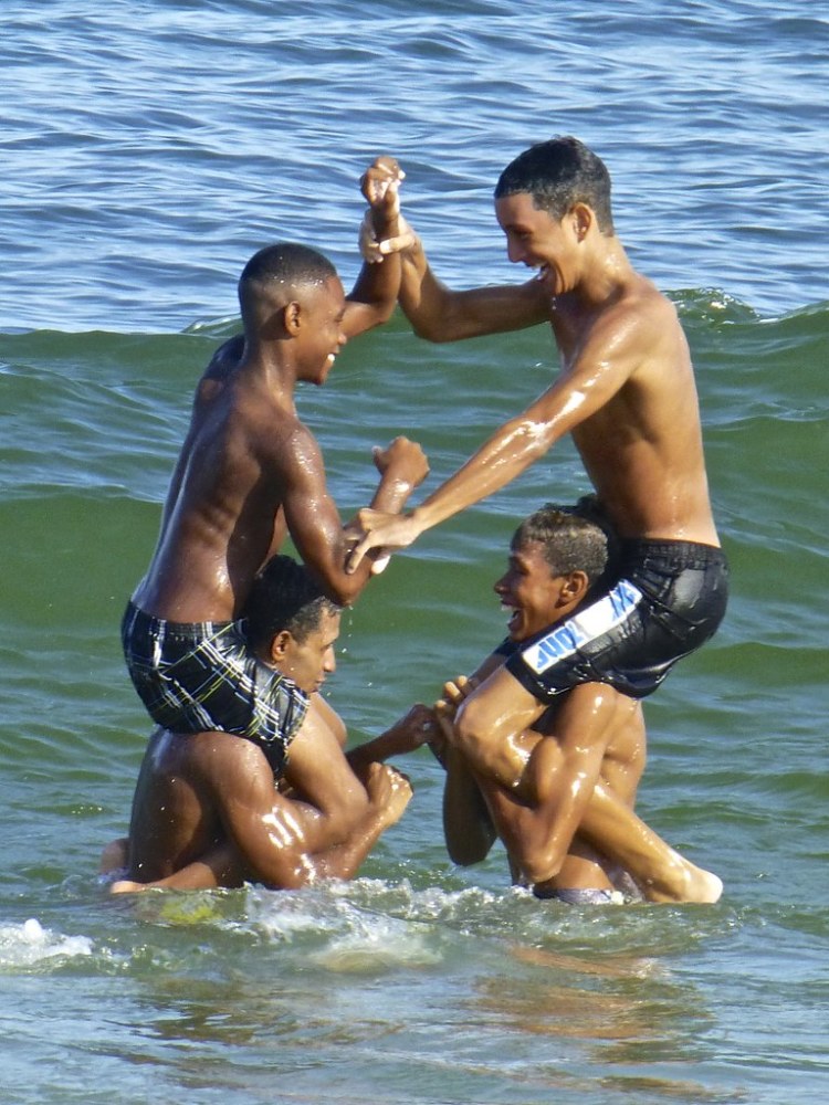 Happy Brazilian Boys Copacabana beach, Rio de Janeiro, Bra.