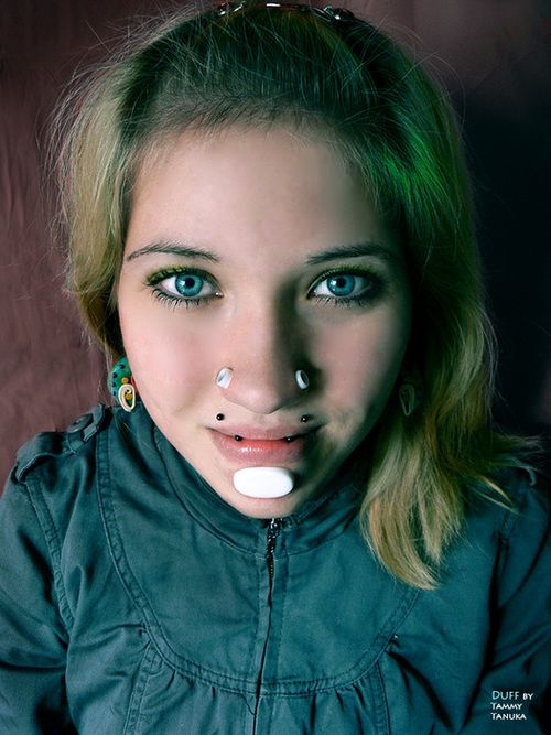 I'm really considering taking out my lip piercing and gettin